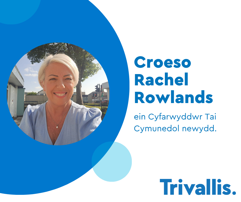 Trivallis Housing Landlord Wales A woman with short blonde hair smiles outdoors in bright sunlight. Blue and white graphics display the text: "Croeso Rachel Rowlands, ein Cyfarwyddwr Tai Cymunedol newydd. Trivallis.